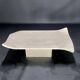 Travertine coffee table with curved corners by Claude Berraldacci. 1990s. France.