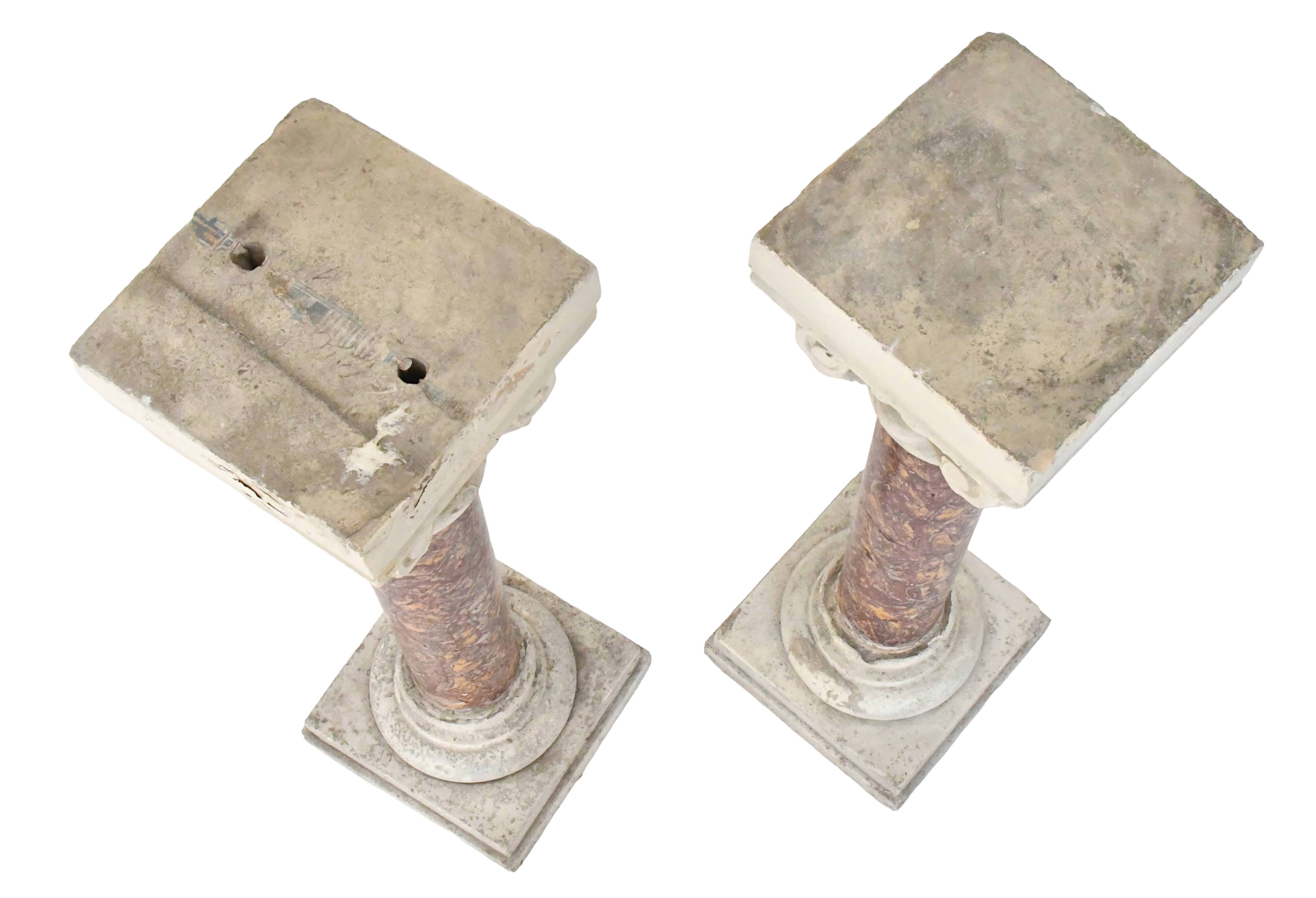 Pair of Brocatelle marble columns and stone with Corinthian capitals.