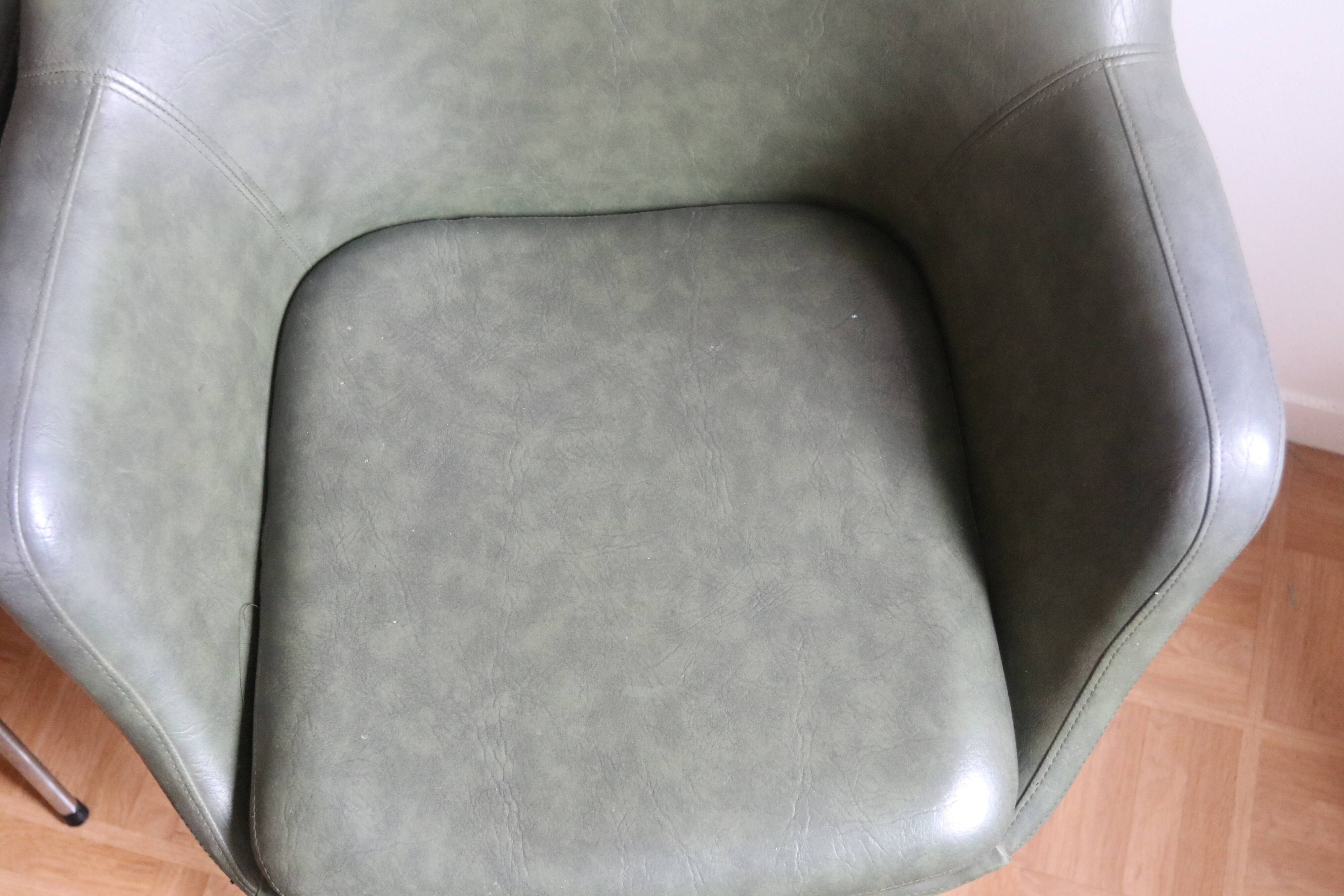 Lot of three armchair in green skai with chrome feet