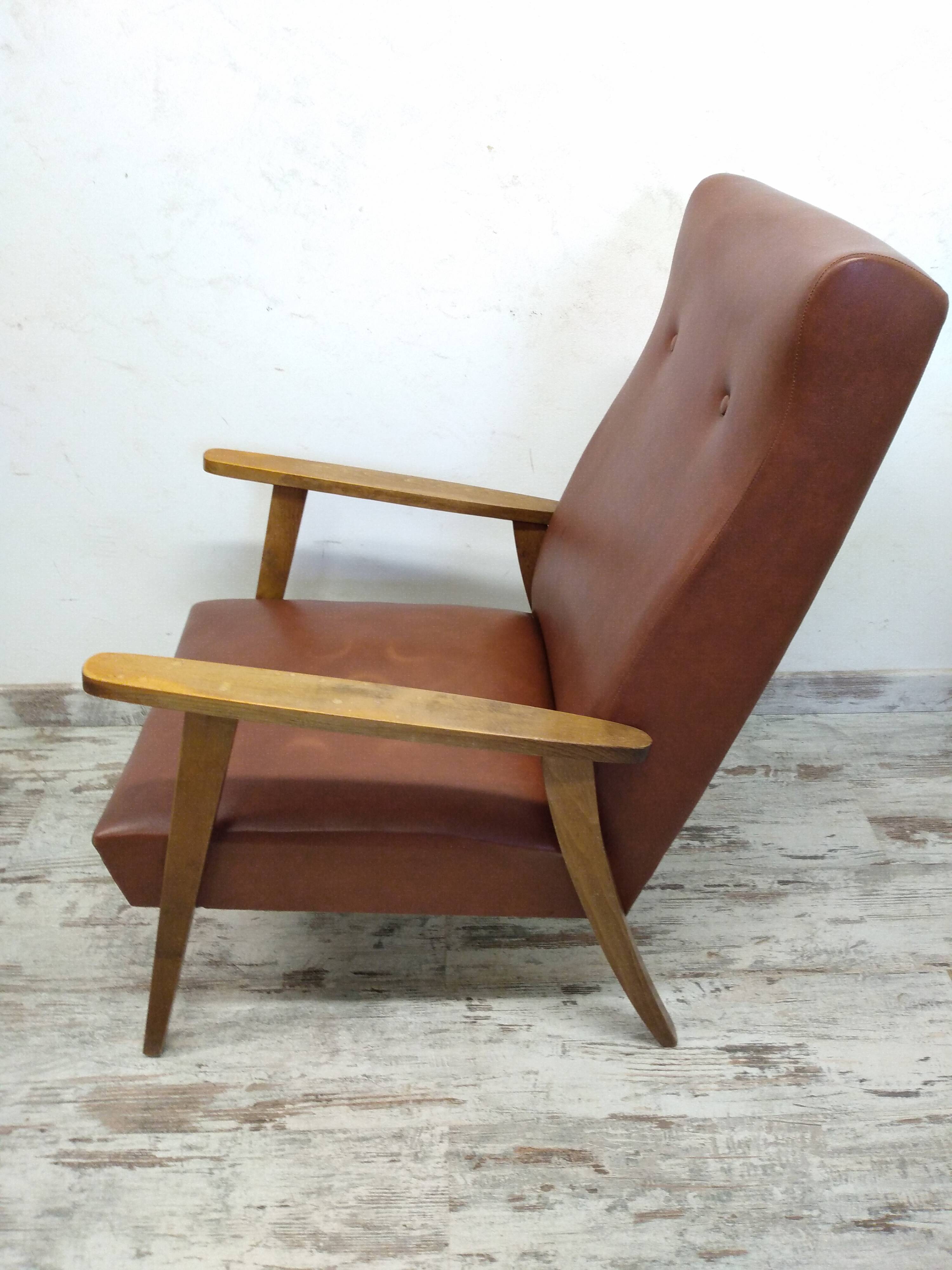 Vintage armchair in wood and imitation leather