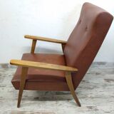 Vintage armchair in wood and imitation leather