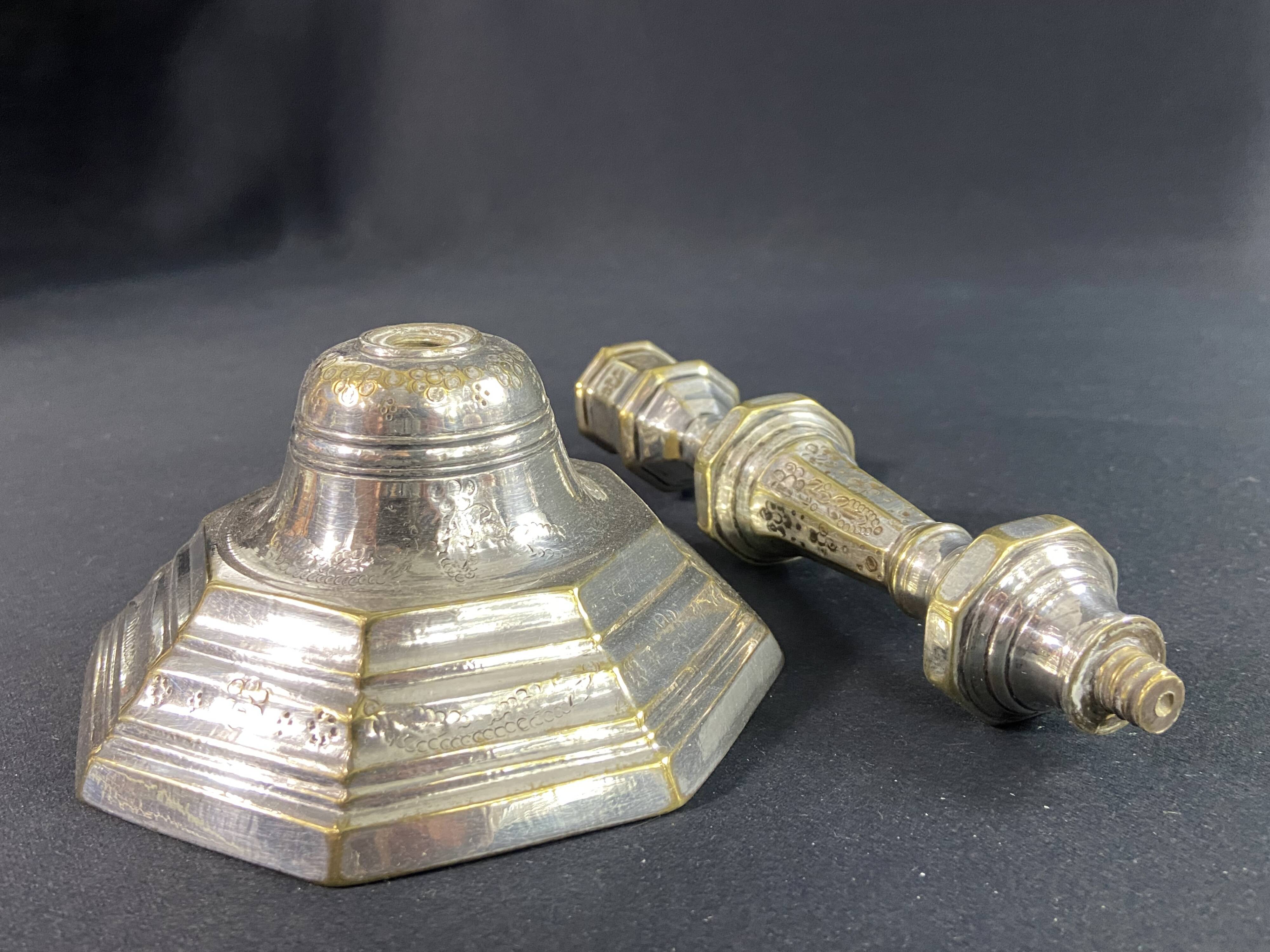 18th century Regency candlestick in silvered bronze with chiseled floral decoration