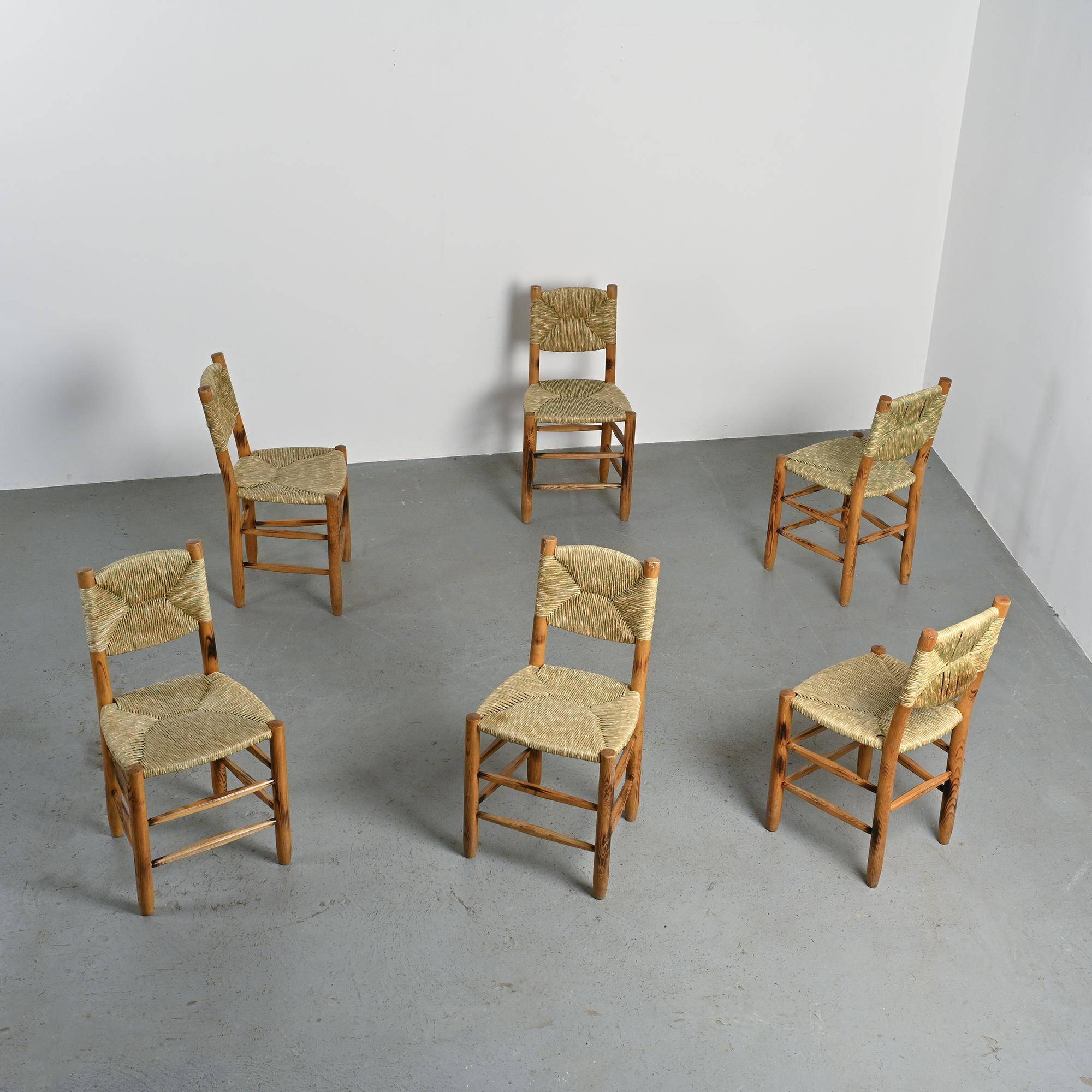 Set of 6 Bauche model chairs by Charlotte Perriand, circa 1960.