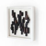 Three-dimensional framed artwork in wenge wood by Studio Aik