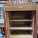Antique double curtain cabinet in oak