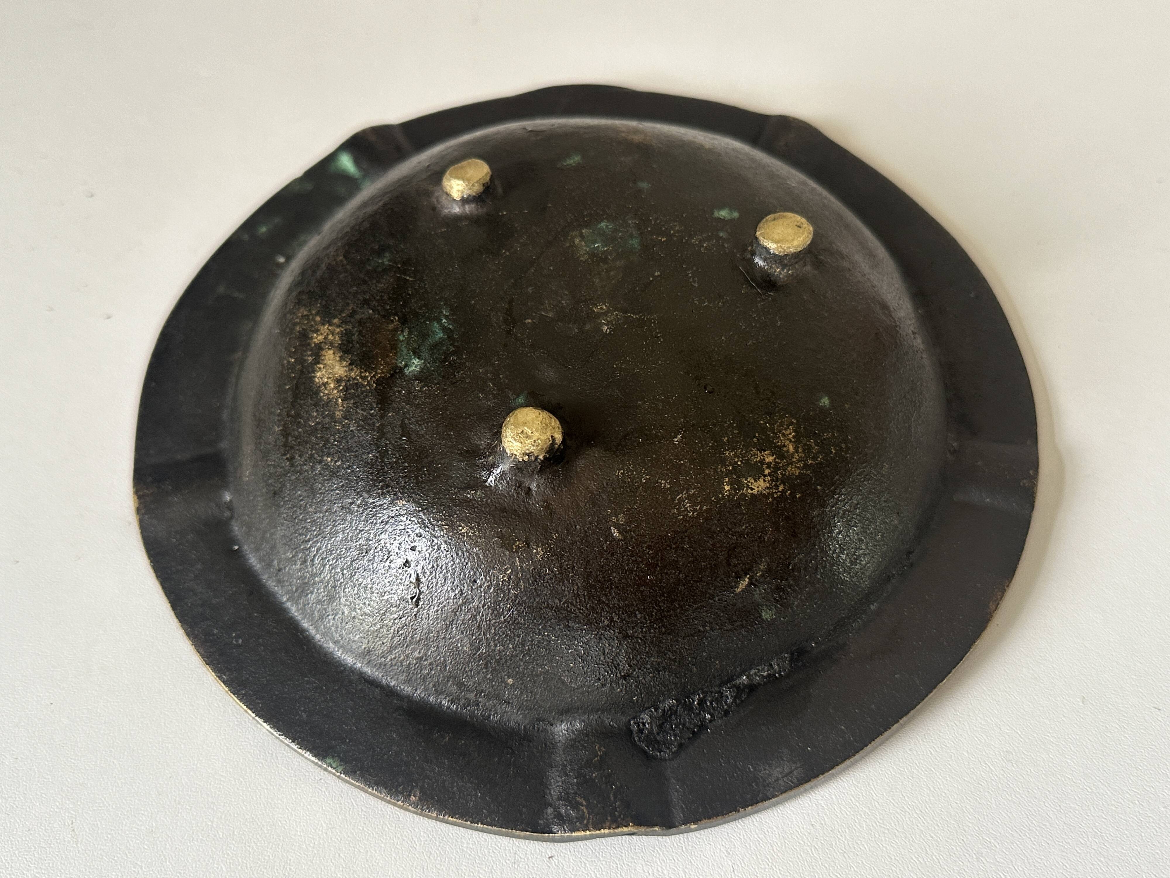 Vintage bronze ashtray design from the 60s