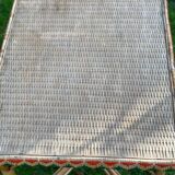 High wicker and rattan table