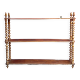 Walnut shelf with beaded wood.