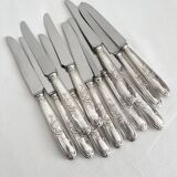 12 antique silver-plated knives with acanthus shell decoration and stainless steel blades.
