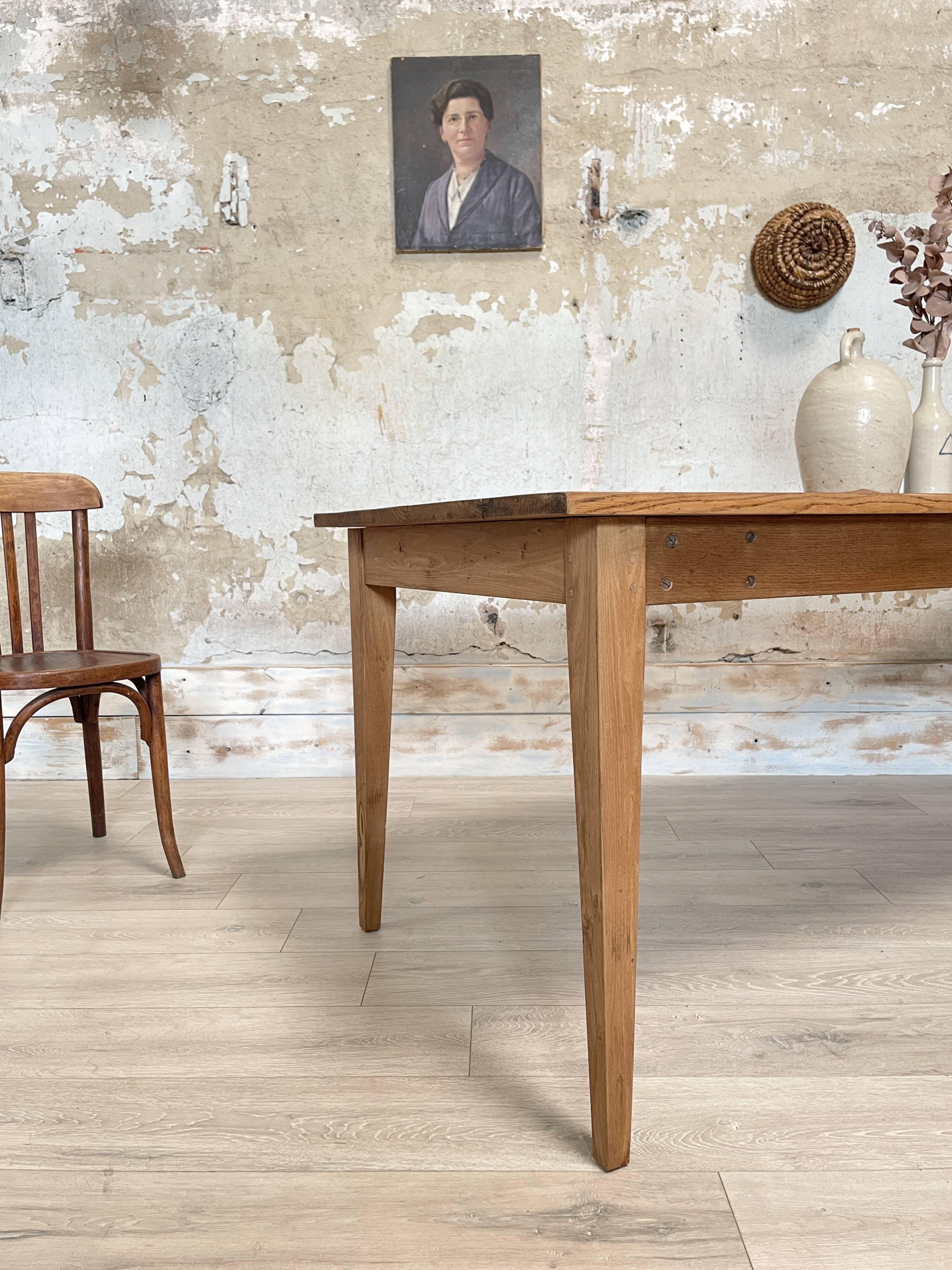 Vintage farm table with spindle legs.