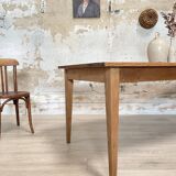 Vintage farm table with spindle legs.