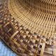 Asian hat made of bamboo and braided rattan