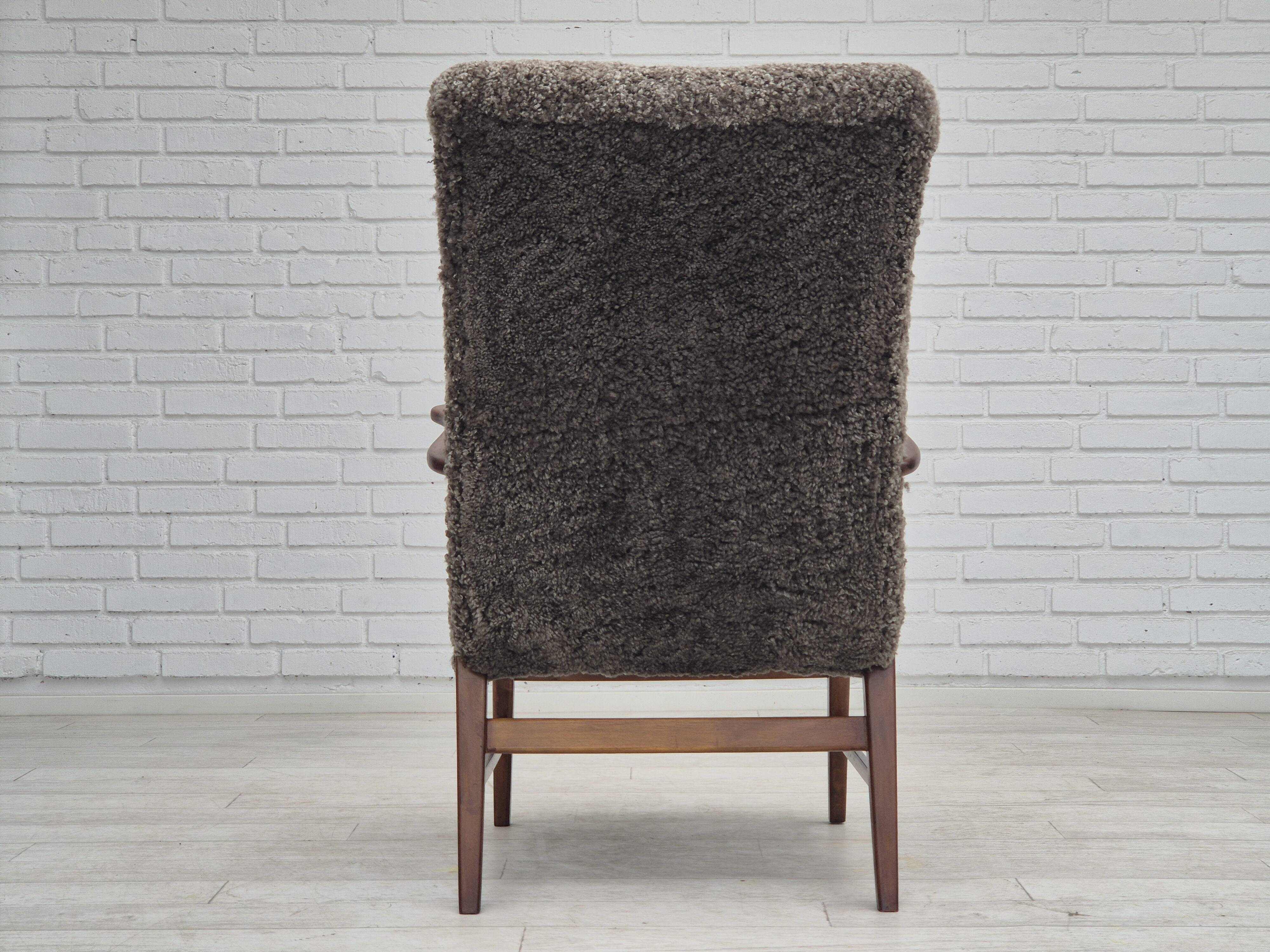 60s, Danish design, refurbished armchair, genuine sheepskin "Wellington".