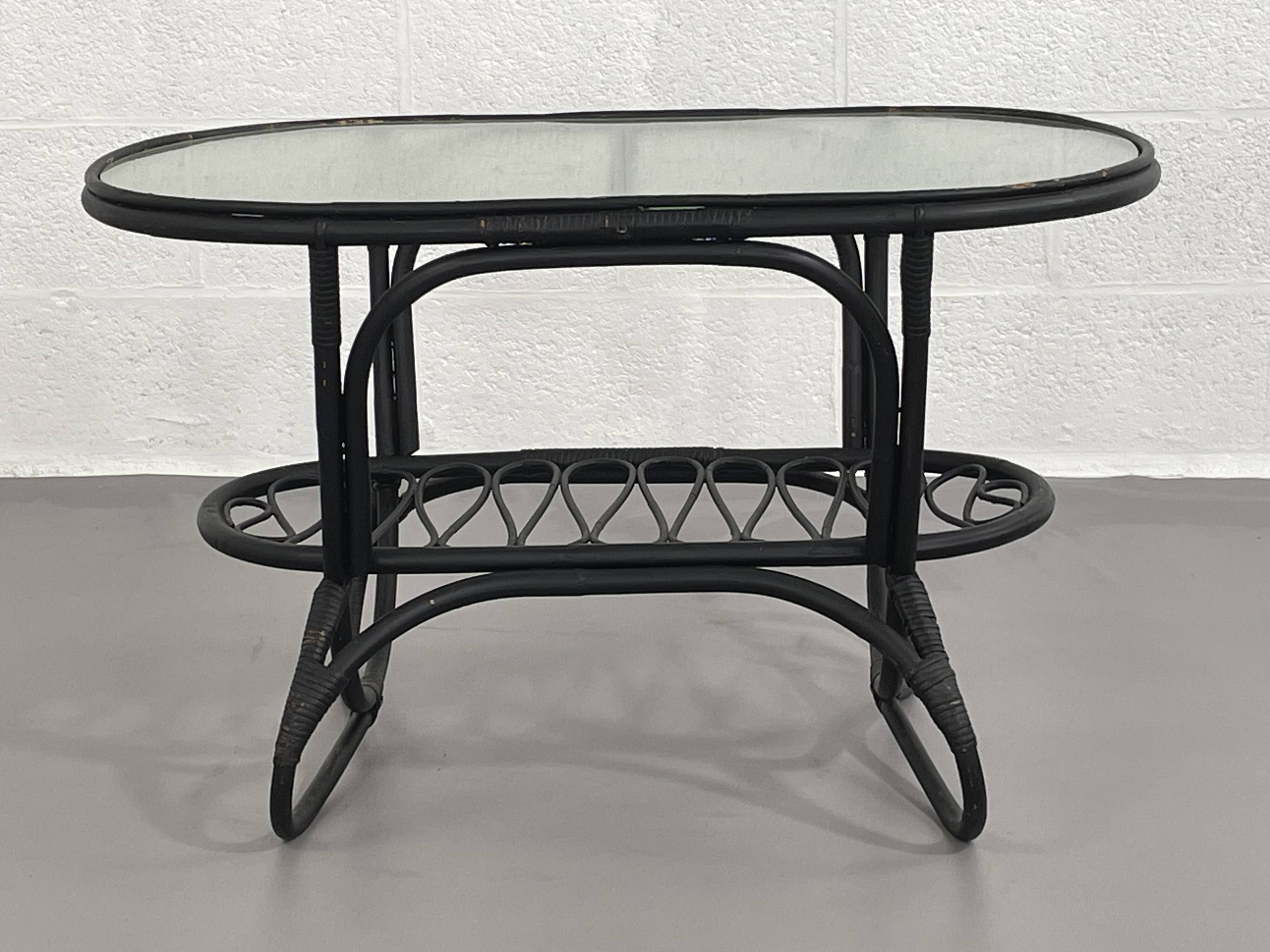 Black rattan and glass coffee table