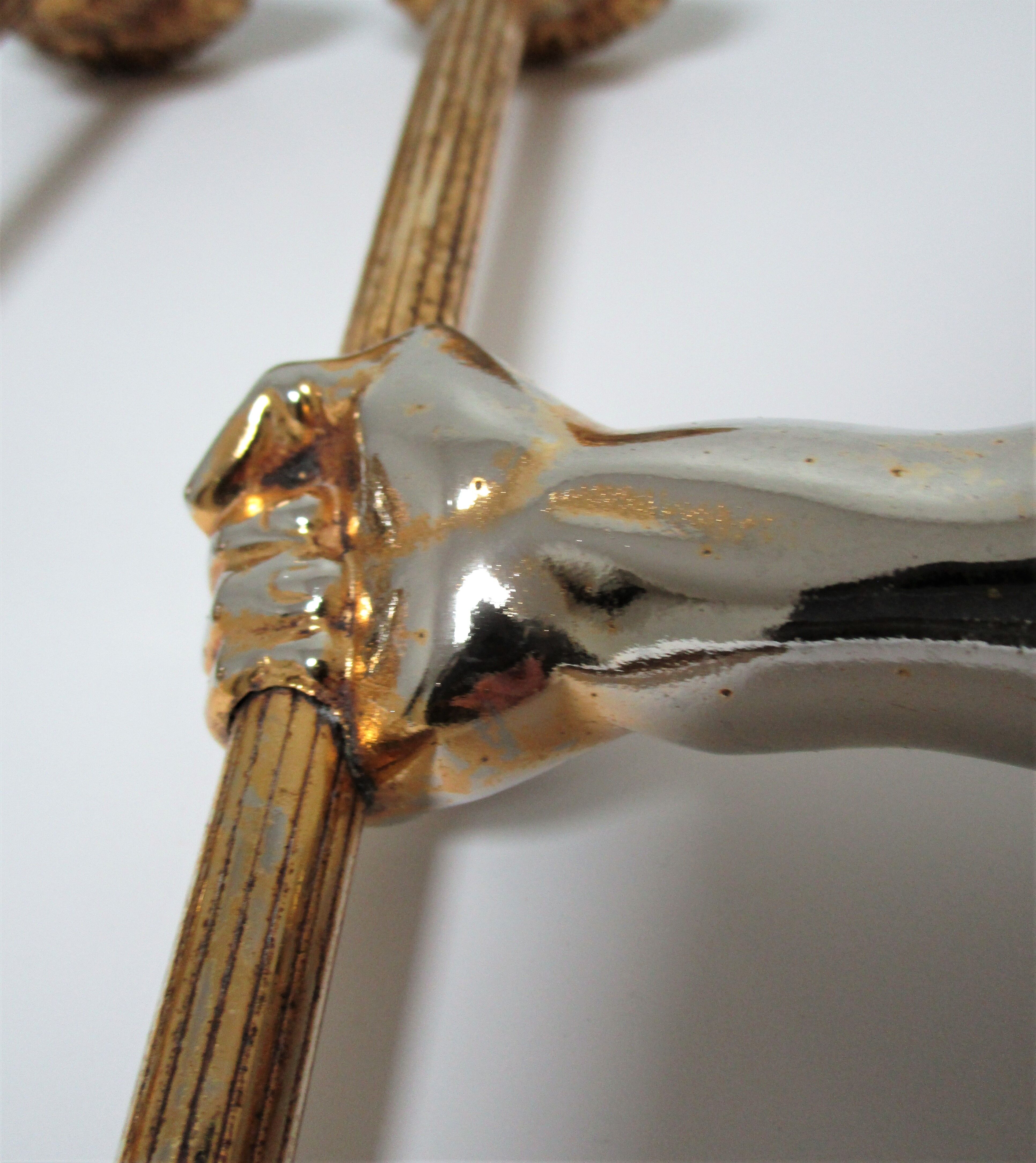 Pair of vintage patinated golden metal hand sconces