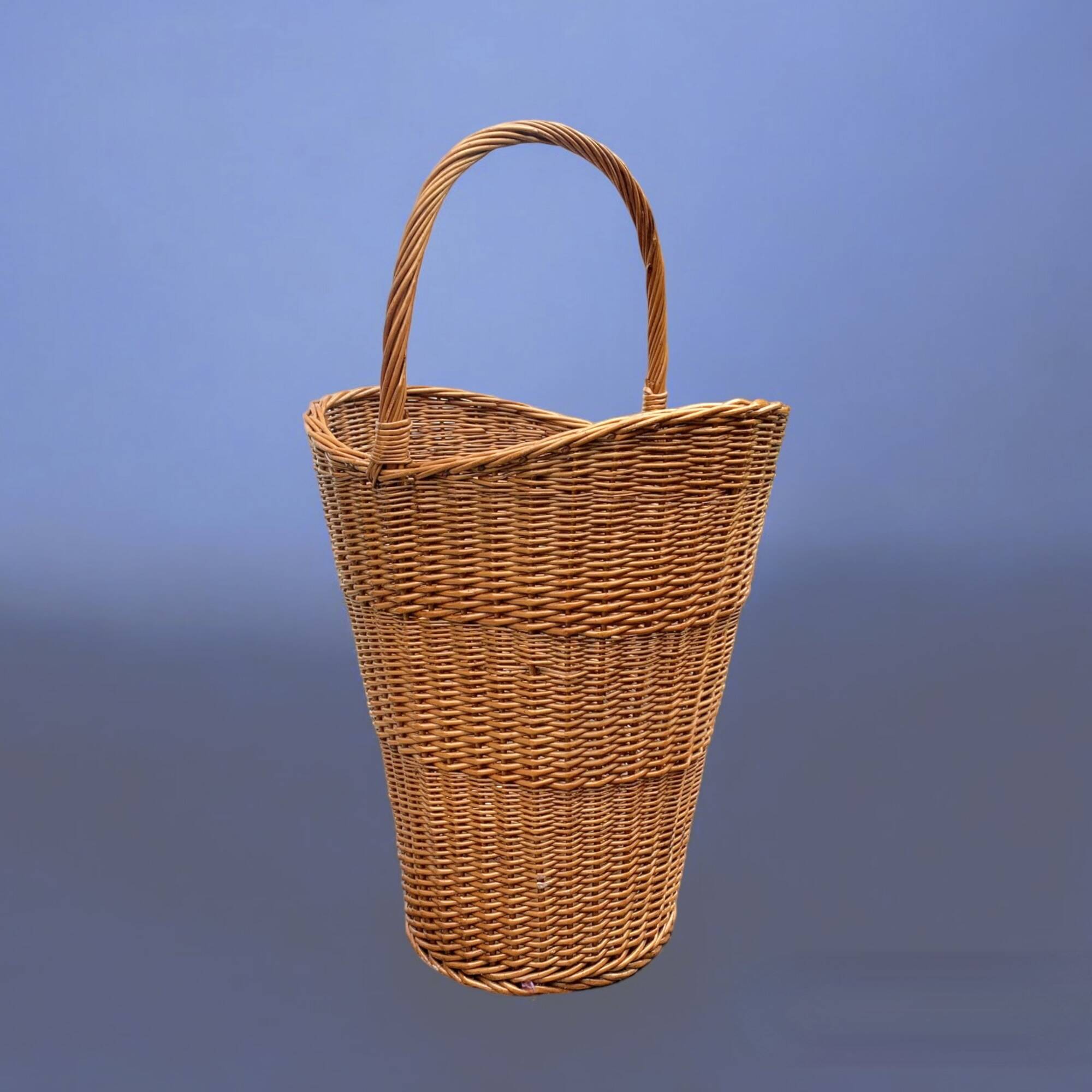 Old woven wicker umbrella stand