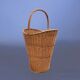 Old woven wicker umbrella stand