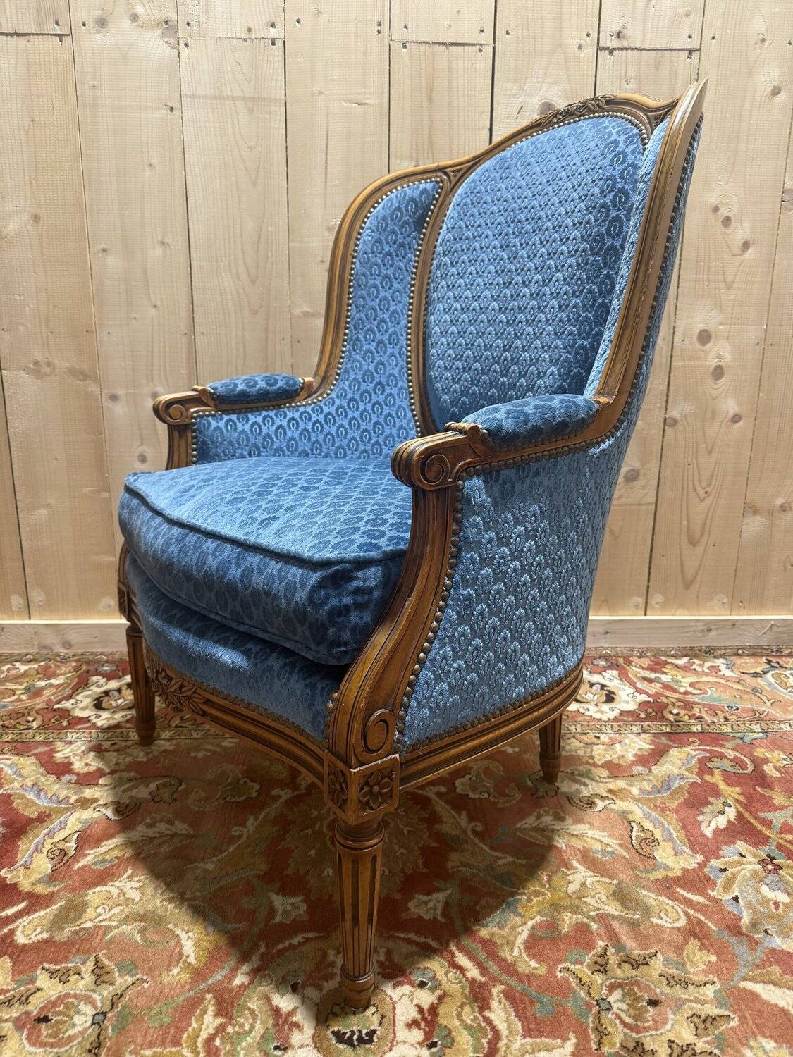 Louis XVI style blue velvet wingback armchair