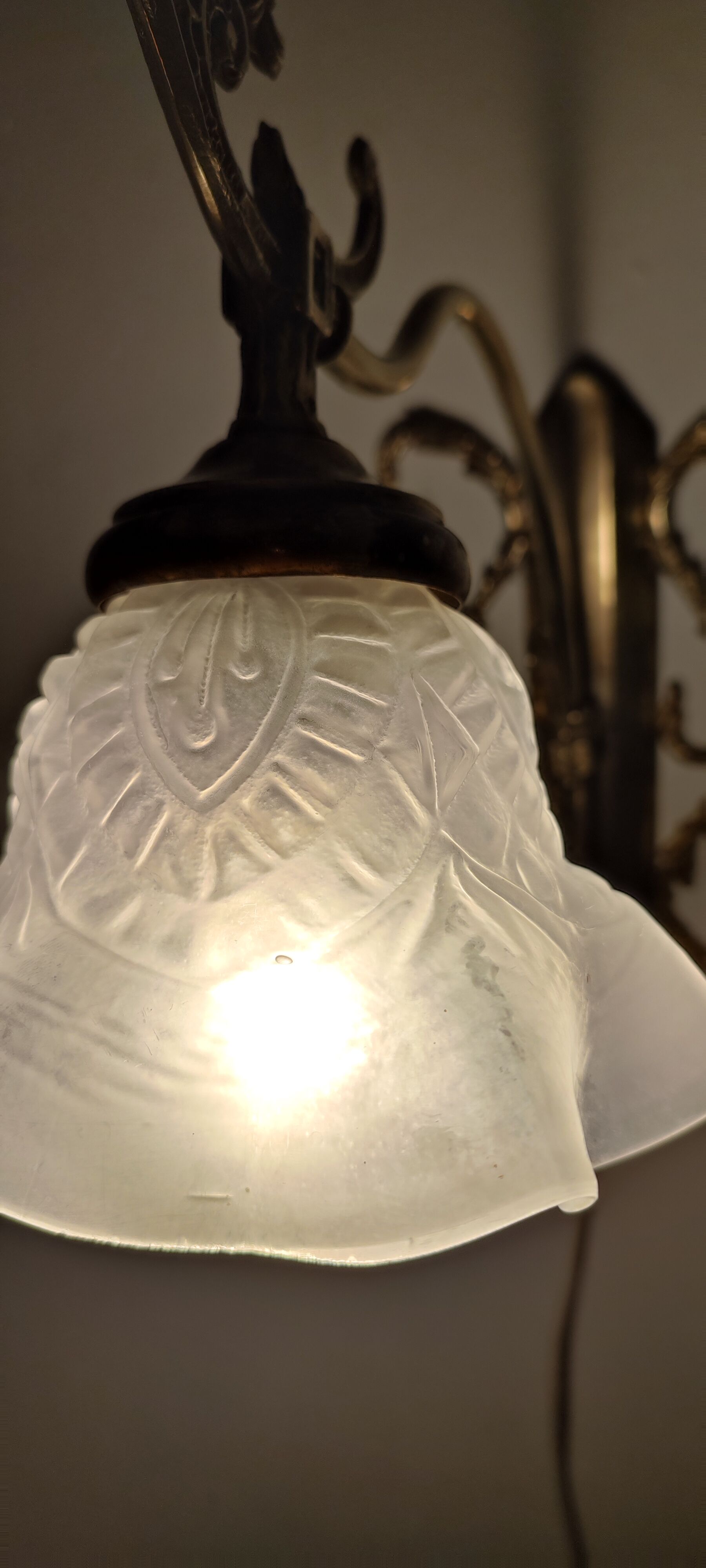 Bronze Modernist wall lamp. Spain, 1930s.