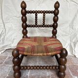 Turned wooden chair by Charles Dudouyt