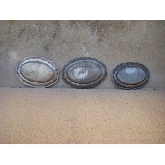 Three dishes in antique tin