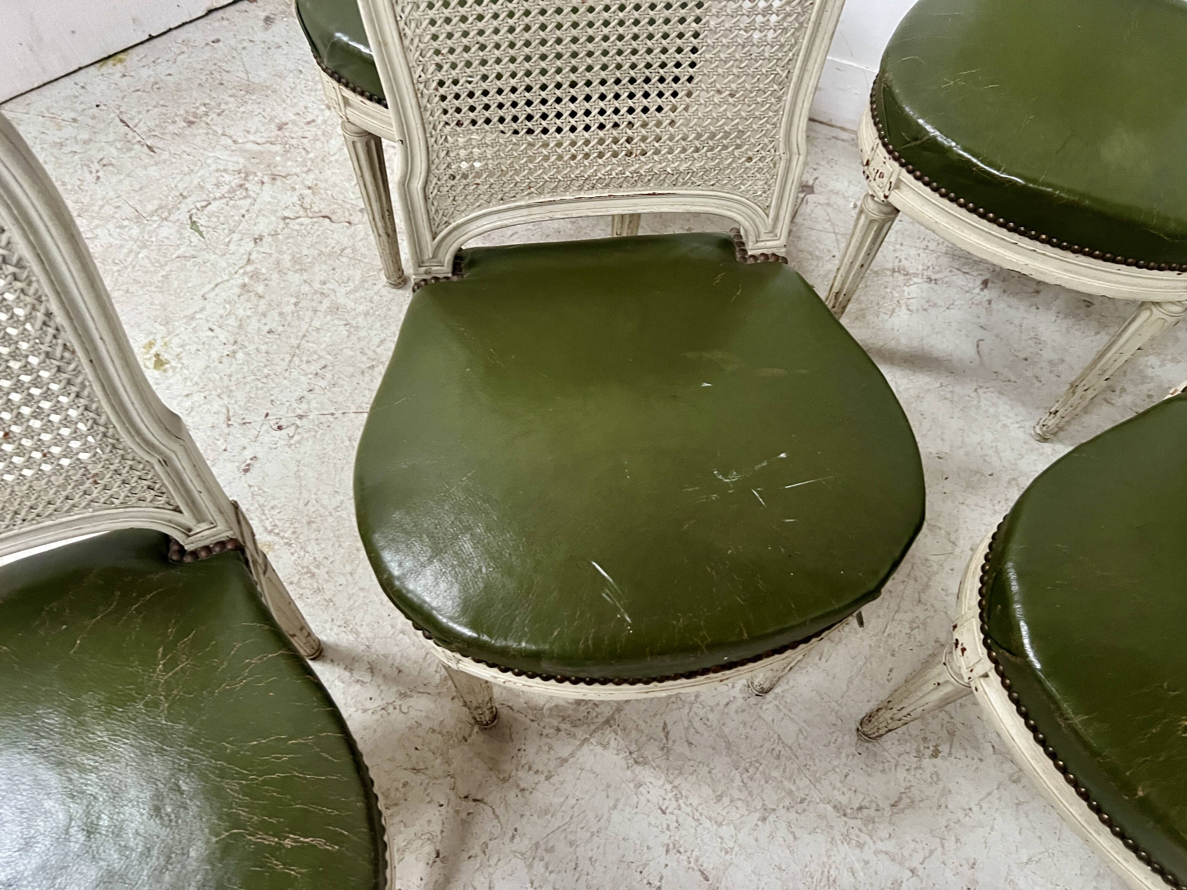Set of seven Louis XVI style chairs in patinated beech, 20th century.