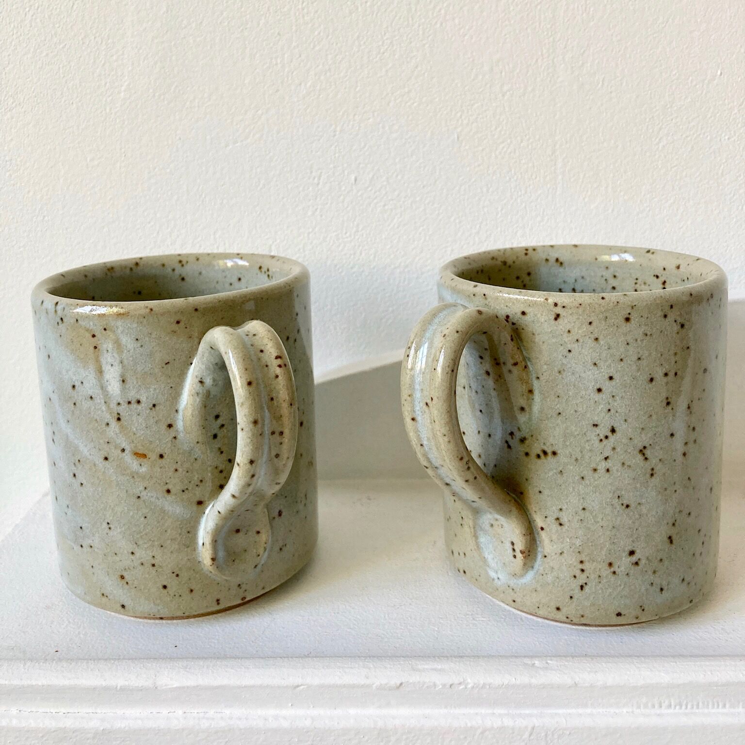 Pair of enamelled stoneware mugs