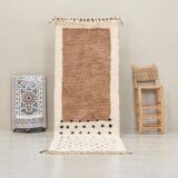 Moroccan polka dot hallway, white and brown beni ourain rug, berber design