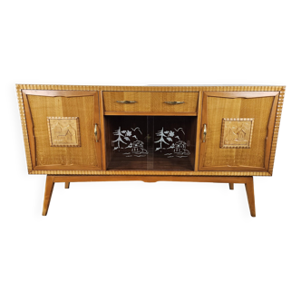 Sideboard in maple with glass sliding doors and worked edges