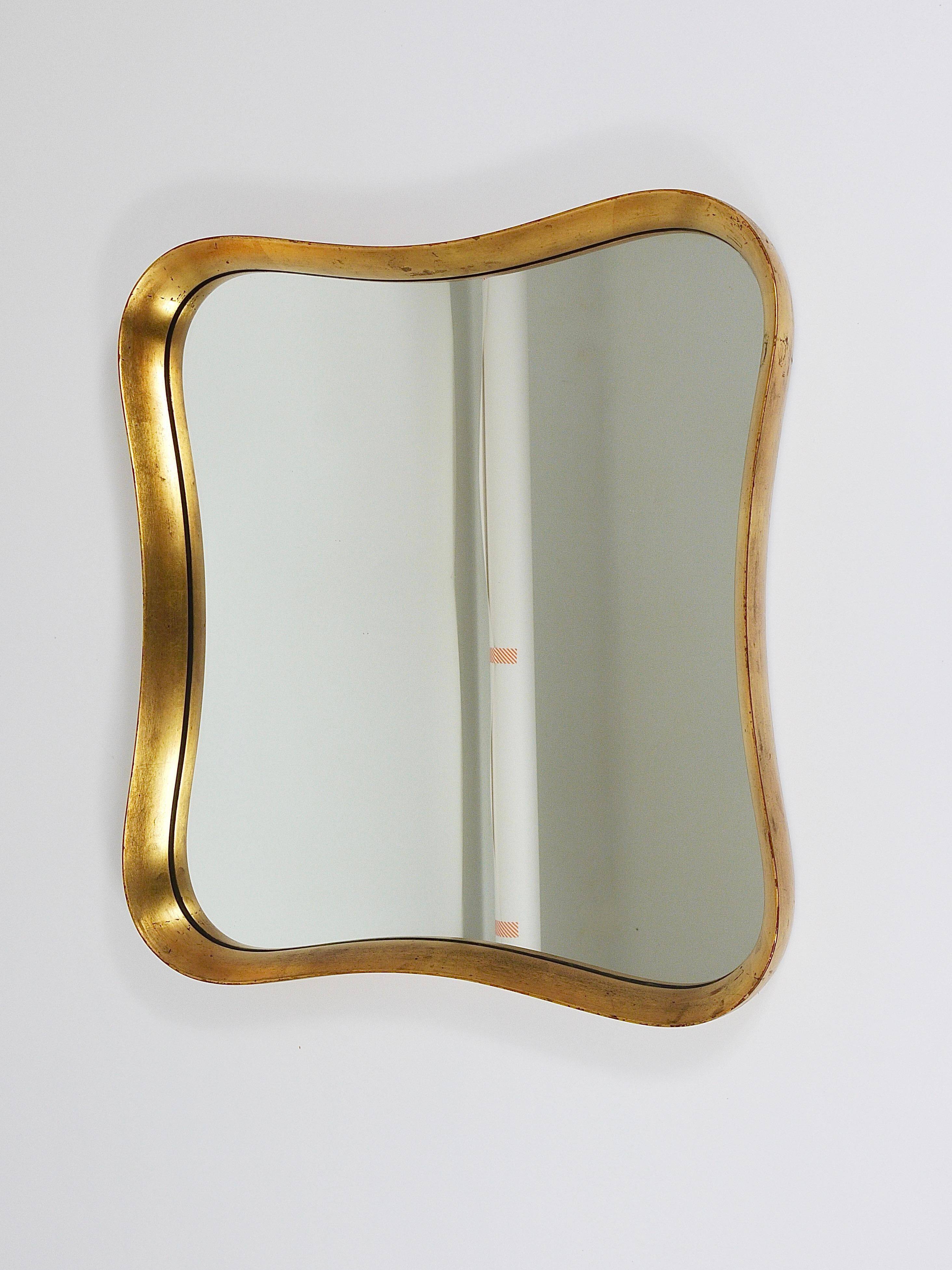 Golden wooden mirror in the style of Gio Ponti by Max Welz, Vienna, Austria, 1940s.