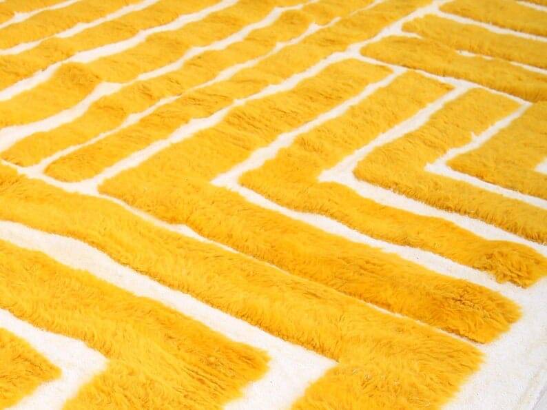 Handmade pure wool rug in traditional yellow, size 150 x 250 cm.
