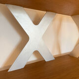 Designer shelf in solid oak and signed aluminium.