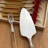 12 pie forks and 1 shovel