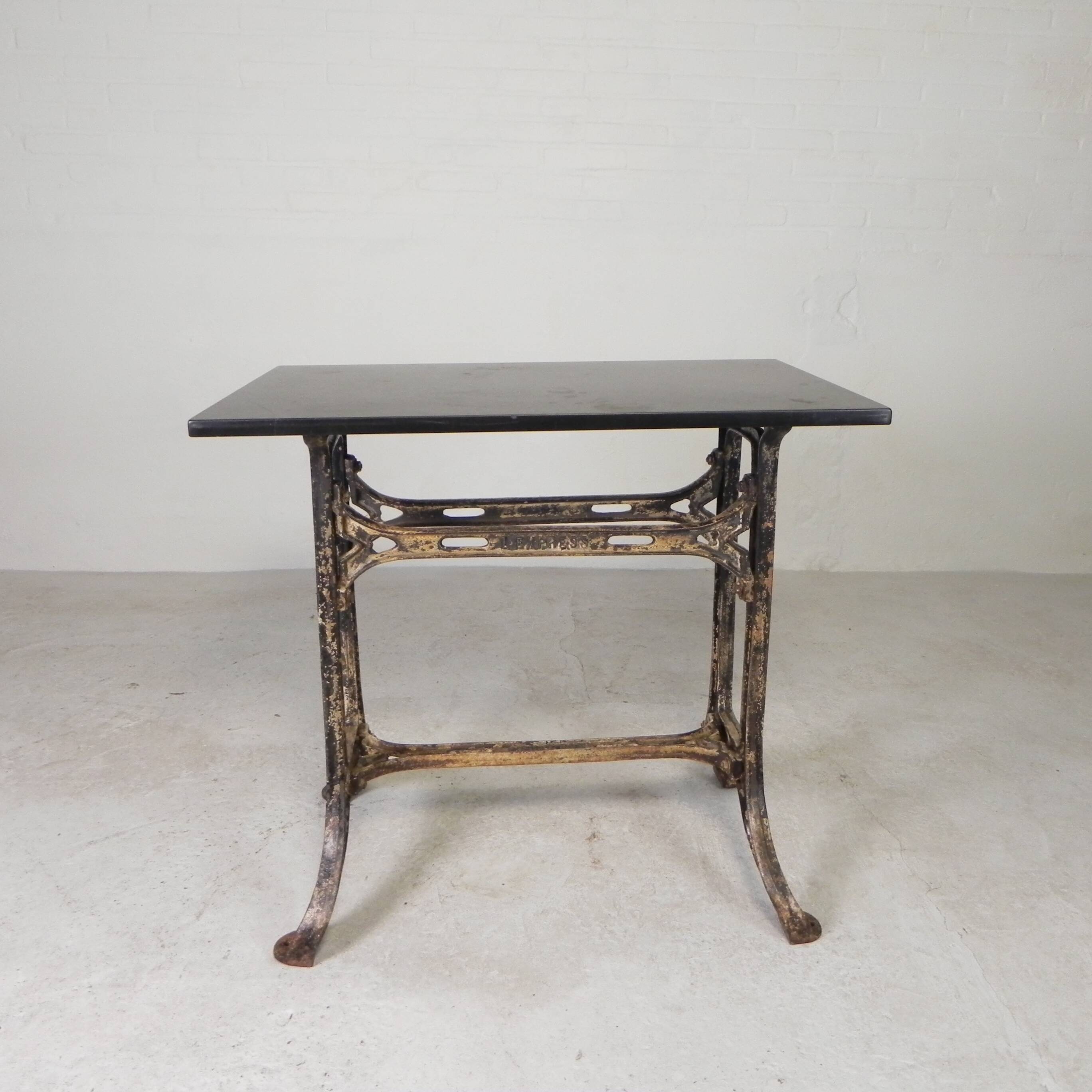 Industrial table, garden table with hard stone slab on cast iron frame, 1930s