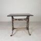 Industrial table, garden table with hard stone slab on cast iron frame, 1930s