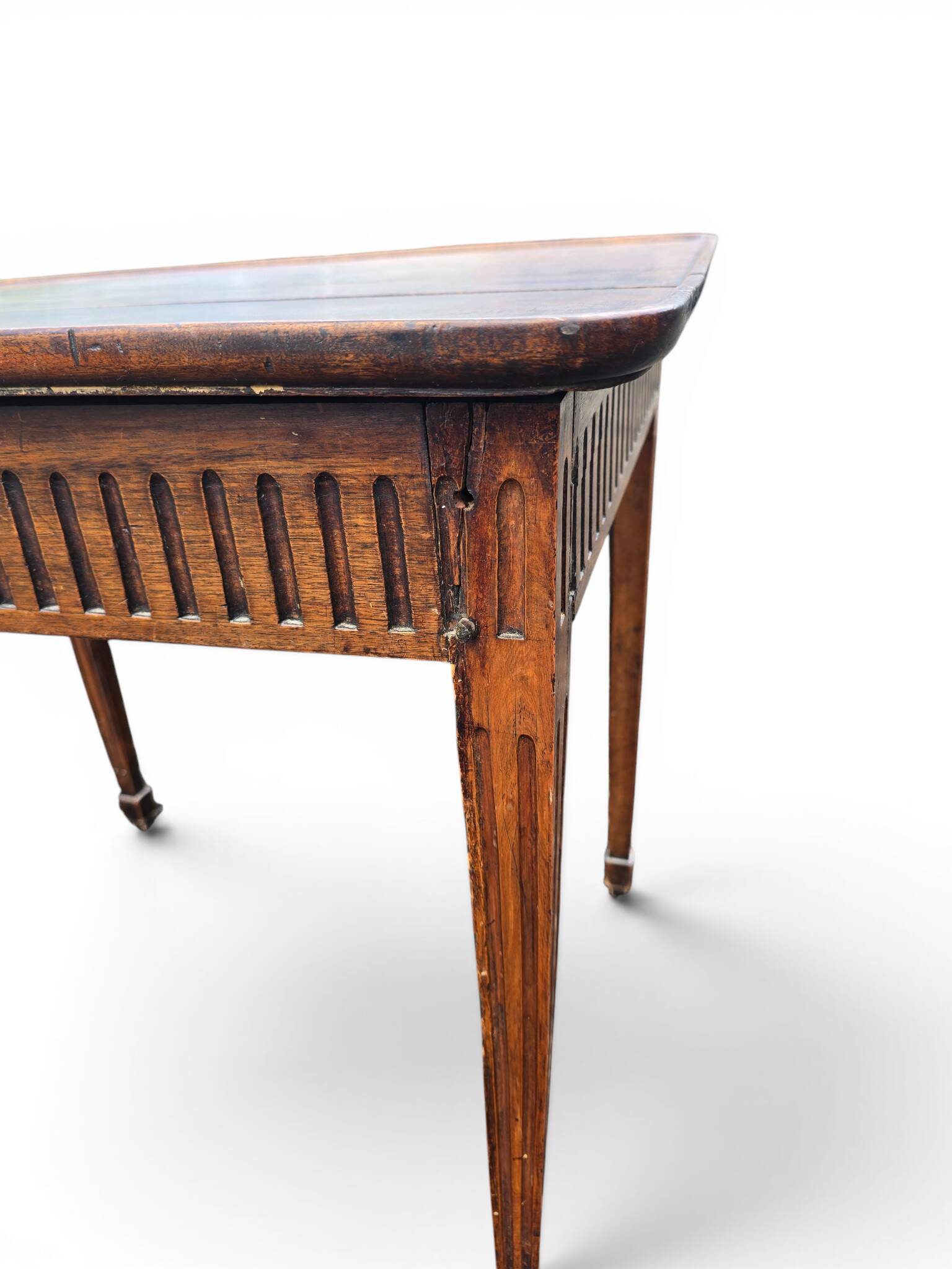 Antique game table in patinated wood in the Louis XVI style.