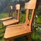 Three solid wood chairs