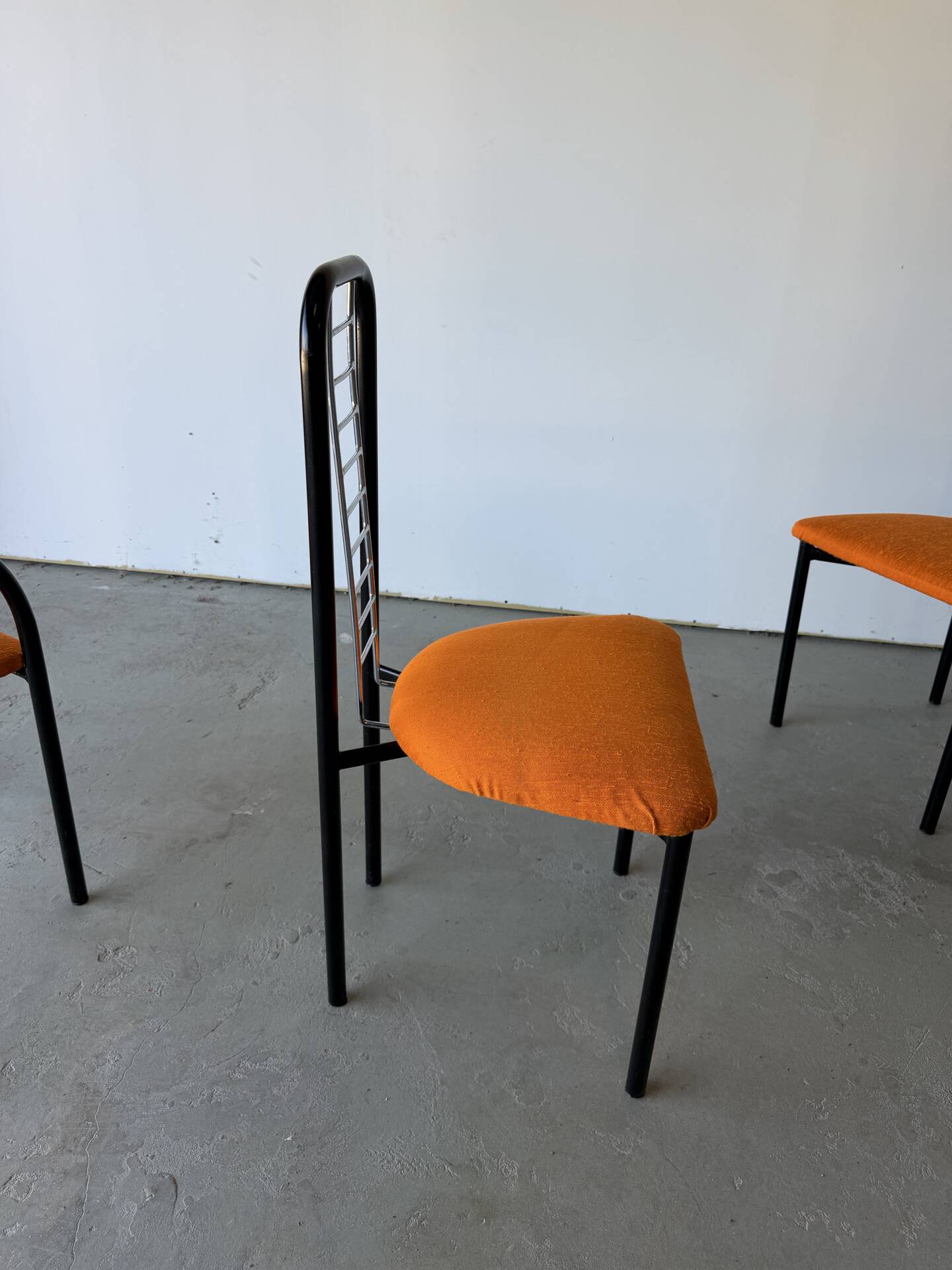 Set of 4 Italian design chairs in vintage black metal and chrome.