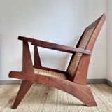 Reconstruction armchair in teak and caning