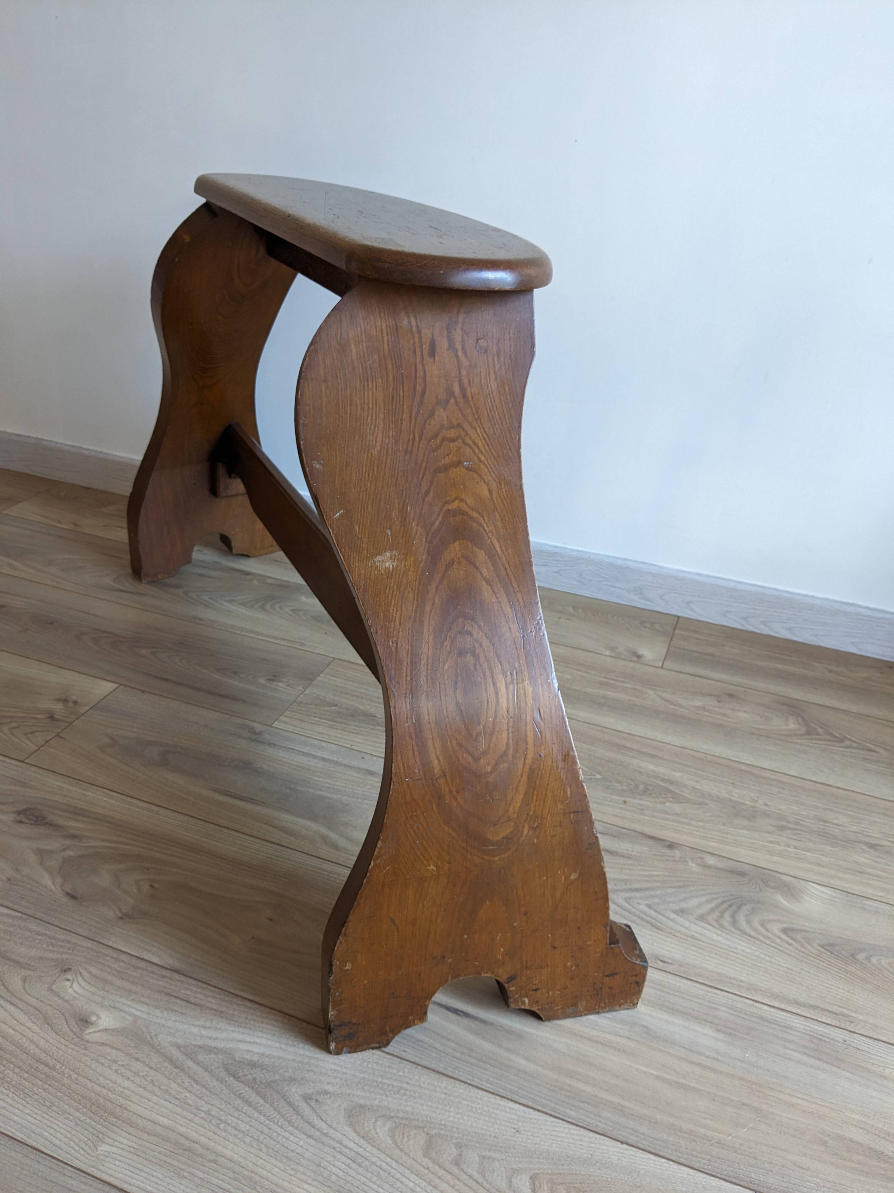 Old church organ bench in Art Nouveau style made of solid oak.