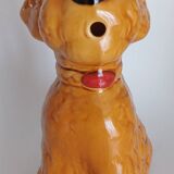Ancient ceramic pitcher in the shape of a poodle.