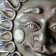 Anthropomorphic sun wall sculpture in patinated terracotta, vintage Italian craftsmanship.