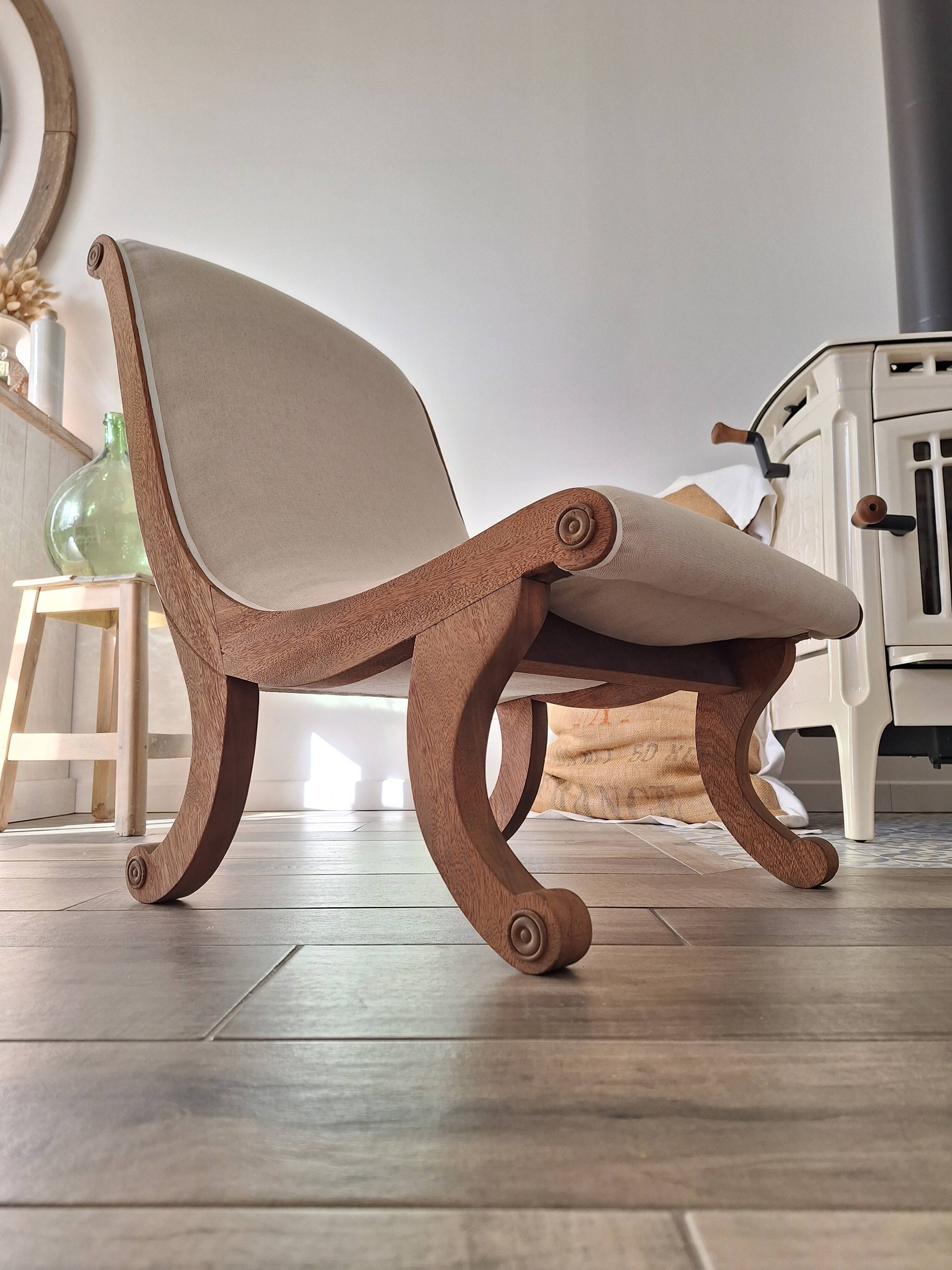 Vintage gondola armchair in beige linen fabric.
