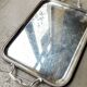 Rectangular silver-plated metal tray with a striated and shell design