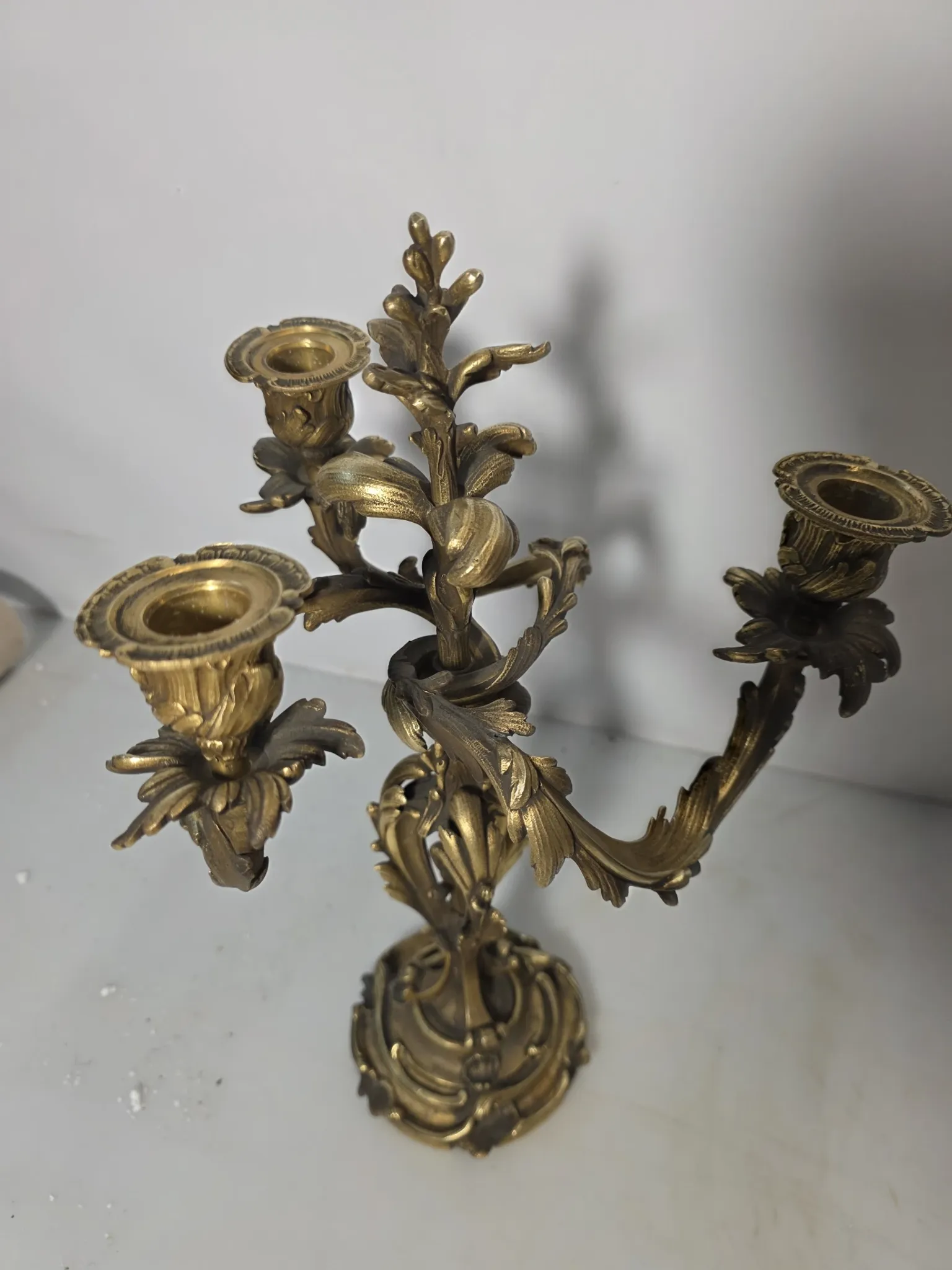 Pair of Louis XV style bronze candlesticks from the 19th century.