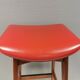 Bar stool, made of teak wood and cognac/red leather. Denmark 1960s