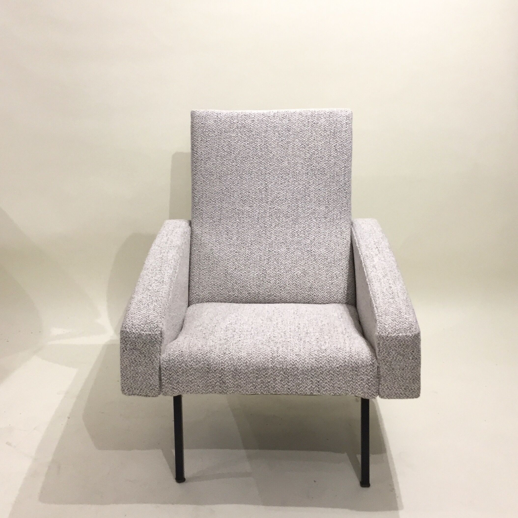 Reupholstered modernist armchair