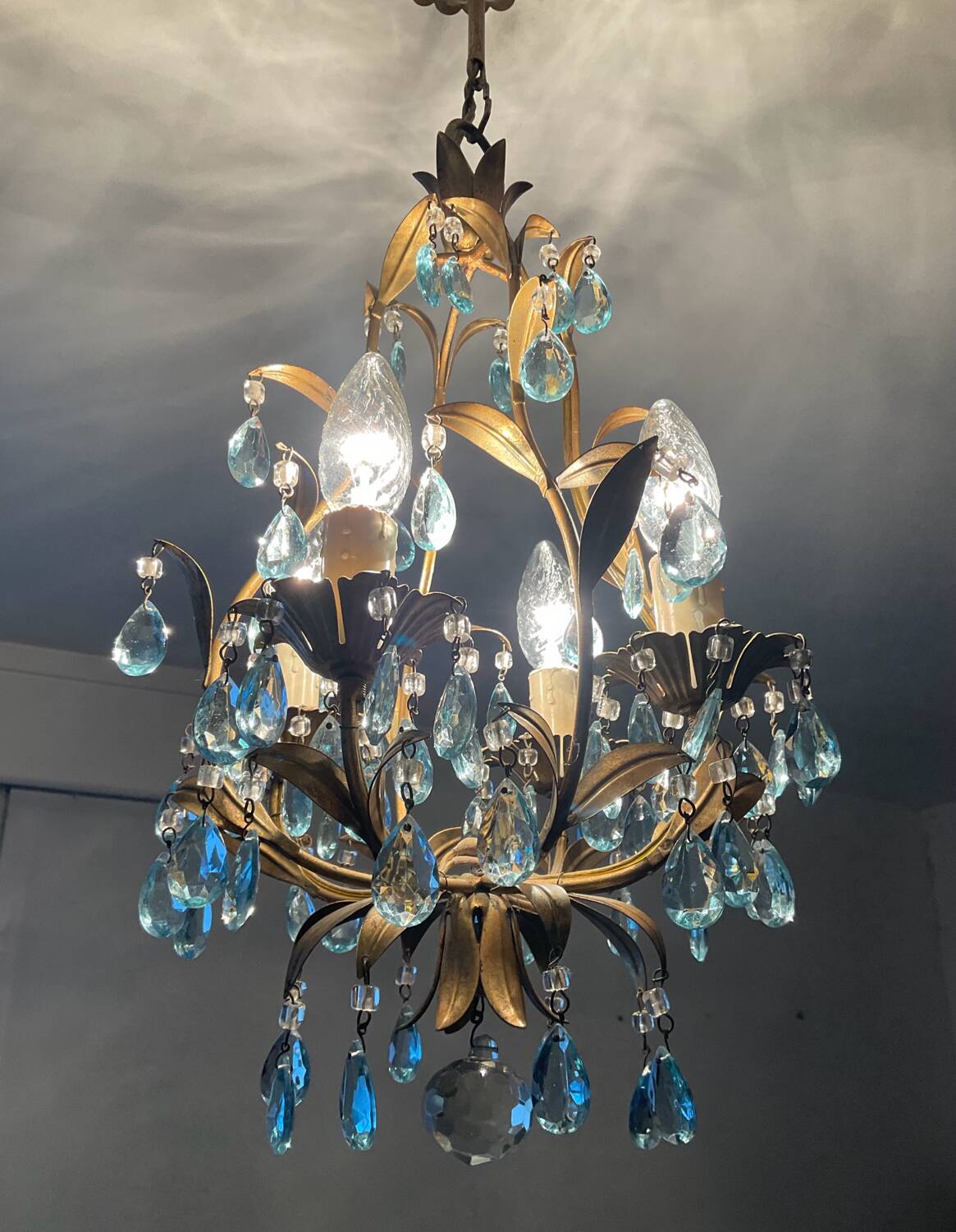 Antique Italian chandelier with cage and blue tassels
