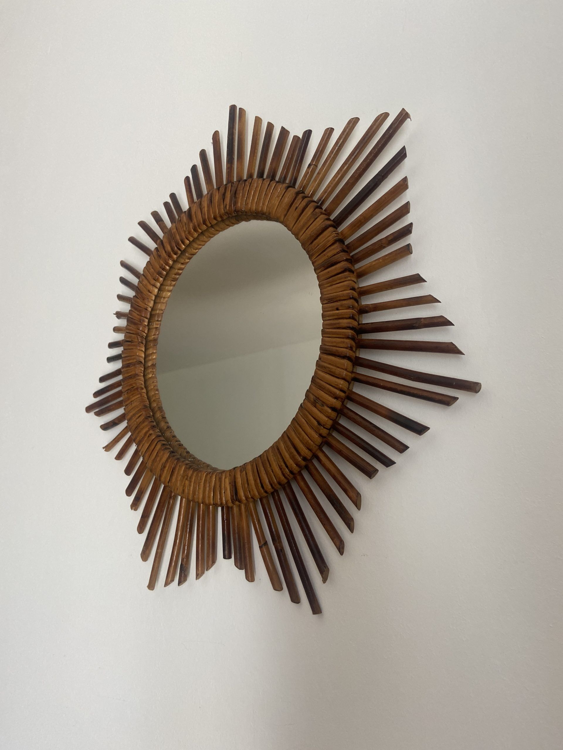 Vintage rattan sun mirror