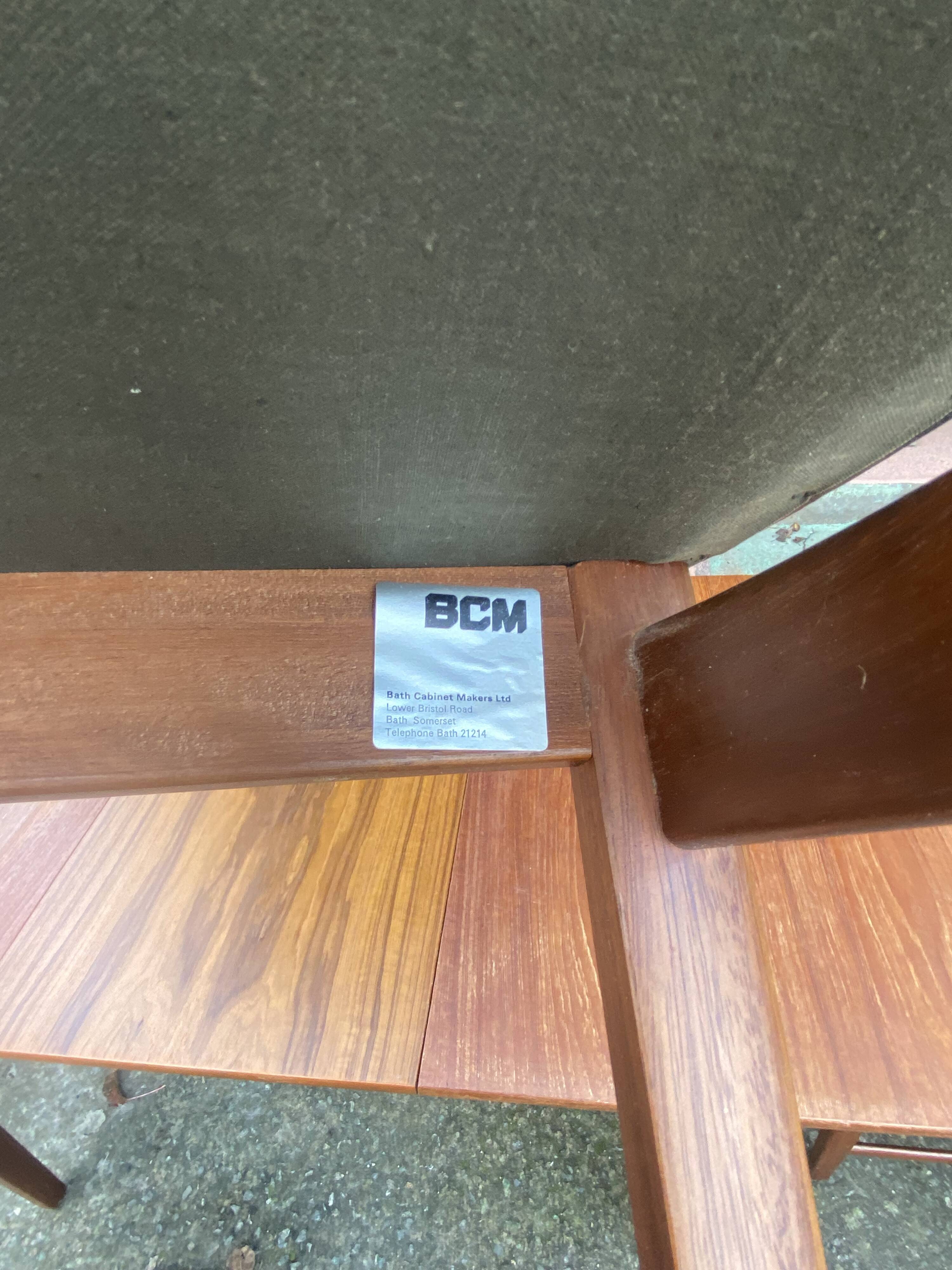 Set of 6 chairs and dining room table with extensions “BCM” circa 1960